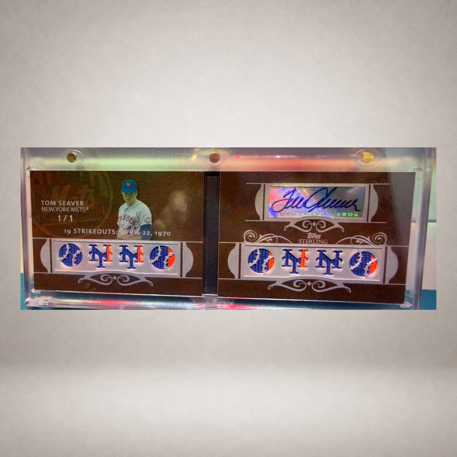 Open Tom Seaver Topps Sterling autograph relic booklet marked one of one