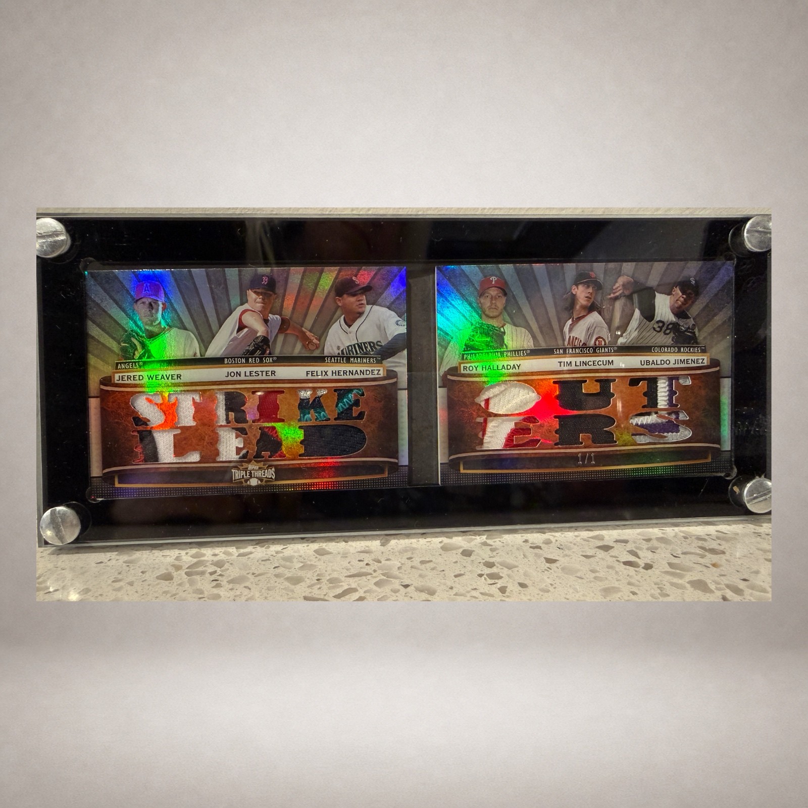 Open Halladay and Lincecum Topps Triple Threads six-player relic booklet marked one of one